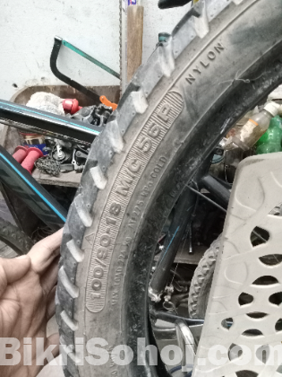 Ceat 100/90-18 grip tyre for sale
